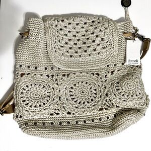 The Sak hand-crocheted “Sayulita” backpack purse. NWT